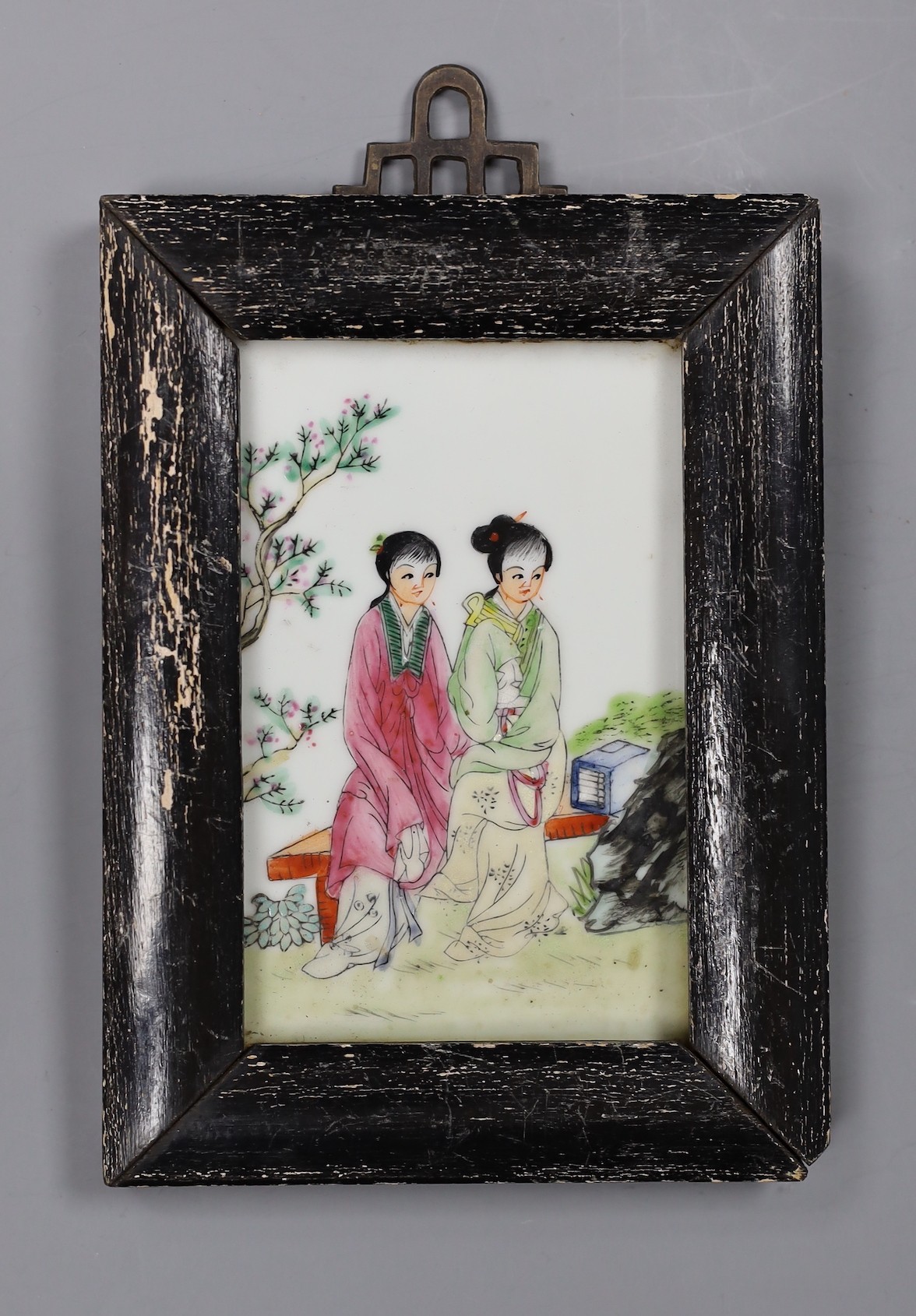 A Chinese famille rose plaque, framed, 13cms high x 8.5cms wide